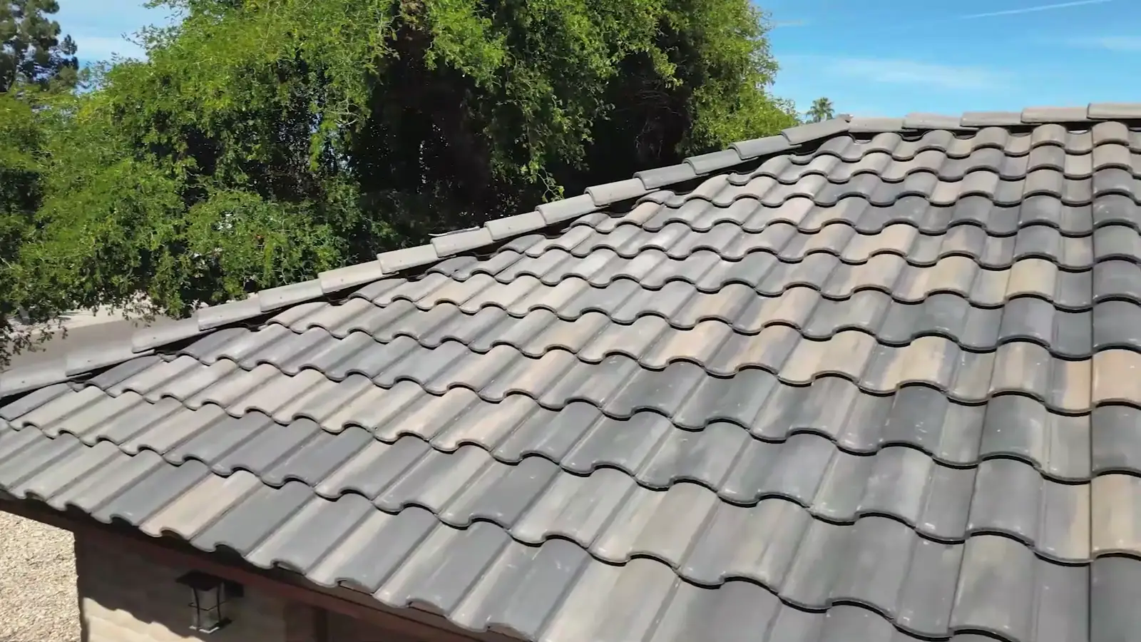 Top-down drone view of a completed concrete tile roof by Allstate Roofing in Phoenix